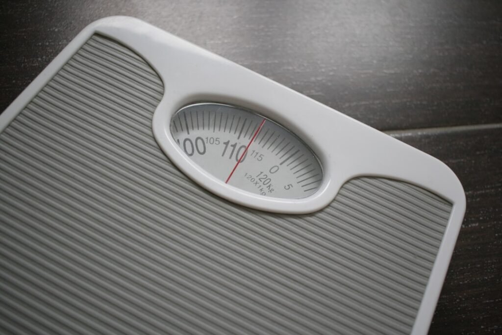 Bathroom scale representing BMI and healthy weight tracking