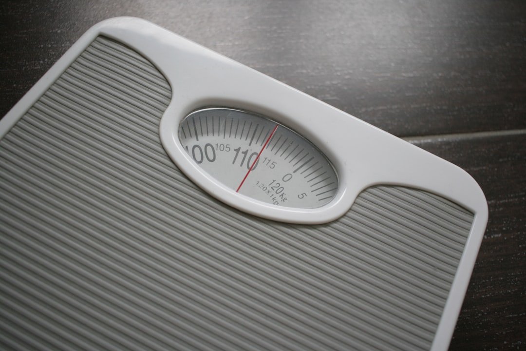 Bathroom scale representing BMI and healthy weight tracking