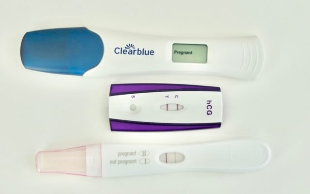 Positive pregnancy tests representing early signs of pregnancy