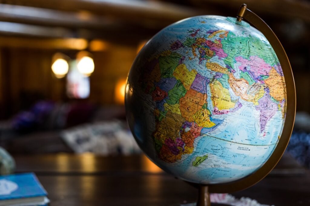 Desk globe representing how age is calculated differently around the world