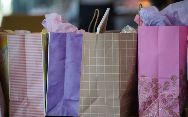 Shopping bags representing mistakes people make calculating stacked discounts