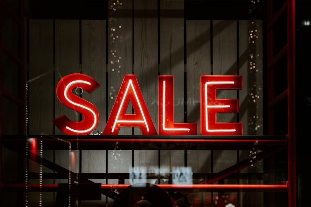 Retail sale sign representing discount pricing tricks retailers use