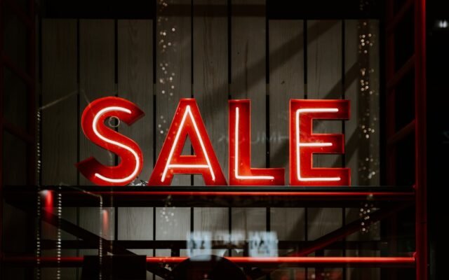 Retail sale sign representing discount pricing tricks retailers use